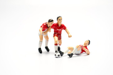 Football player toy, playing football