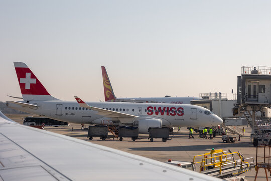 Passenger airplane of Swiss company parked at airport in Milan Malpensa Airport Italy 8 March 2025