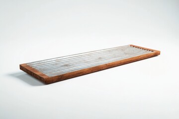 single vintage washboard slightly angled sits on seamless white background with bright lighting