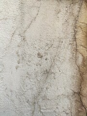 Cracked light wall texture for grunge visuals and architectural mockups