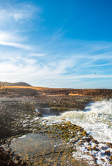 Breathtaking Coastal View at Arcoiris Beach in La Guajira, Colombia with Vibrant Sky and Ocean Waves