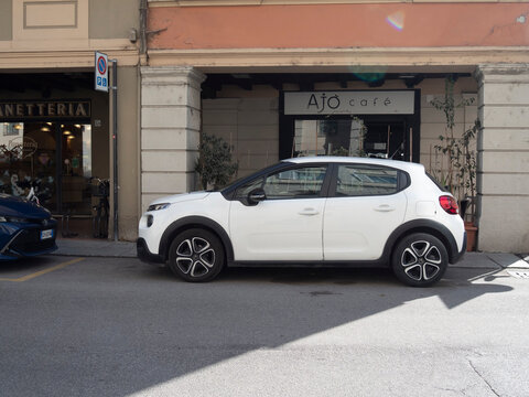 Cremona, Italy March 15th 2025 White Citroen C3 Aircross parking in urban street