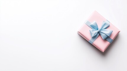Pastel pink gift box with light blue ribbon.  A simple, elegant gift presentation