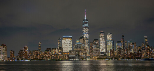 Obraz premium Evening Manhattan. New York night panorama. World Trade Center at night. Skyline of lower Manhattan with World Trade Center.