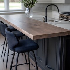 Modern kitchen island walnut countertop, dark cabinets, bar stools, breakfast