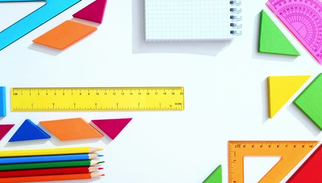 Back to School, Stop Motion, and Stopmotion concept with colorful geometry tools, rulers, and pencils. Perfect for education, learning, mathematics, office work, planning, and creativity.