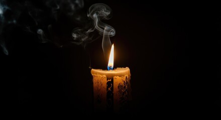 Candle with melted wax and smoke in dark setting