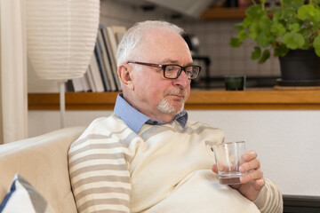 Senior Man Drinking Water. High quality