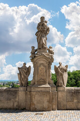 Stone statue of St Joseph stands on the parapet of Baroque Gallery in Kutna Hora in Czech Republic