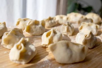 Homemade manty on a wooden board