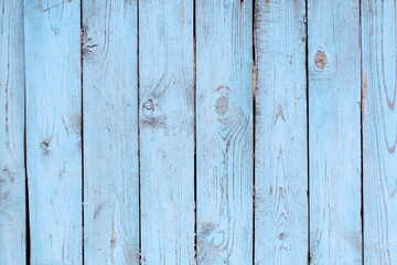 Naklejka premium Texture of wooden fence painted with blue paint.