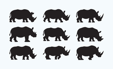 Fototapeta premium Minimalist Rhino Silhouette Set – Vector Black Rhino Icons on White Background