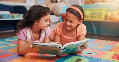 Girls, reading book and friends on carpet, school and learning with education, smile and bonding...