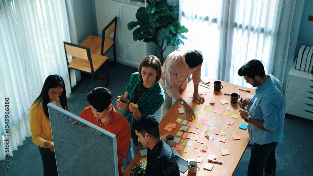 Poster top view of diverse business people writing and stick sticky notes at whiteboard. creative team work