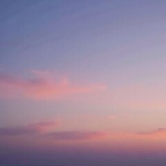 Soft gradient sky with shades of orange and purple hues, gentle sunset colors, peaceful atmosphere, abstract background, watercolor effect