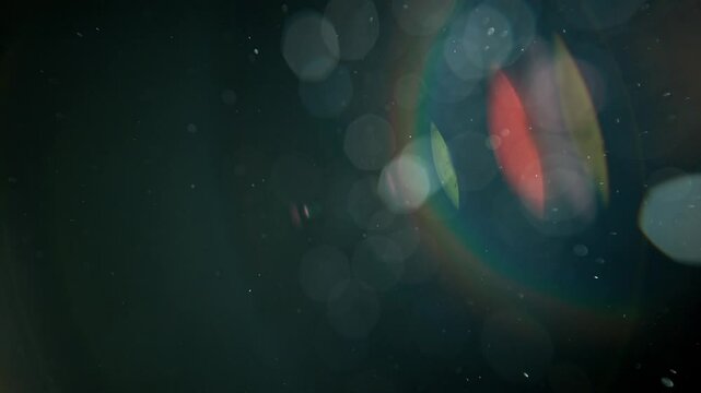 Slow motion real lens flare through glass effects for overlay or transition