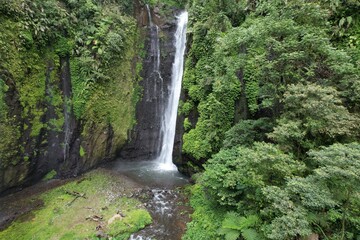 Beautiful waterfall surrounded by lush greenery in Garut, West Java Indonesia, Curug Ciarjuna, Garut, West Java