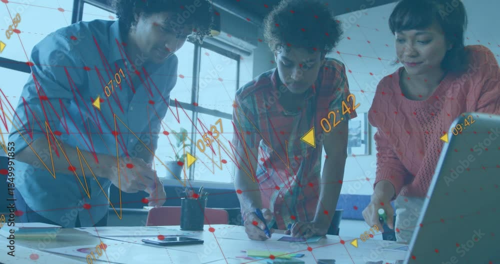 Poster analyzing data charts with animation overlay, diverse team in office setting