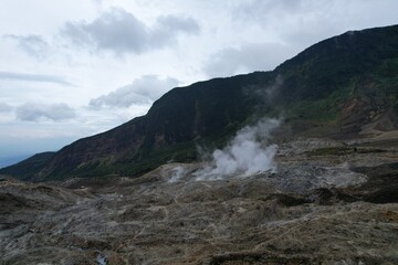 The drone view of Papandayan Mountain in Garut Regency, West Java, Indonesia. It was taken on January 14 2025 by a professional. It's an iconic mountain in this regency