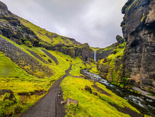 Iceland's Kvernufoss cascades, long-exposure shot.