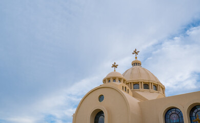 Coptic Orthodox Church in Sharm El Sheikh, Egypt.Against the backdrop of a beautiful sky with...