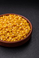 Sweet yellow canned corn in bowl