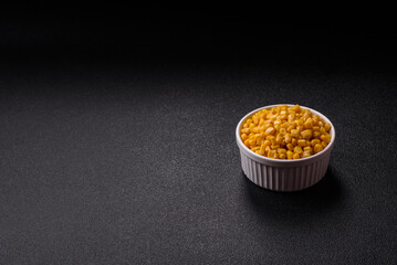 Sweet yellow canned corn in bowl