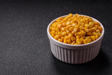Sweet yellow canned corn in bowl