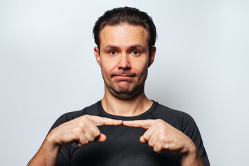 Two fingers touching man portrait on white background