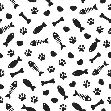 Black cat's paws prints, hearts, fishes and fish bones on white background. Vector seamless pattern.