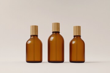 Fototapeta premium Elegant brown glass bottles with wooden caps showcase minimalist