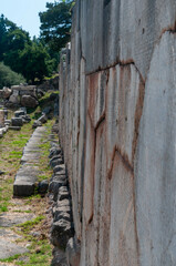Delphi, the ancient sanctuary of Apollo, was the seat of the famous oracle of Greece. Nestled on Mount Parnassus, it features the Temple of Apollo, a theater, and breathtaking ruins with stunning view