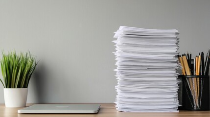Neatly Organized Workspace with Piles of Documents and Supplies
