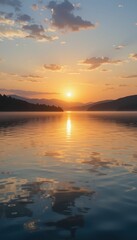 Serene Sunset Over Calm Lake with Reflective Water and Clouds