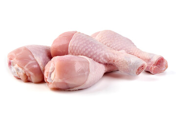 Raw chicken legs, isolated on white background.