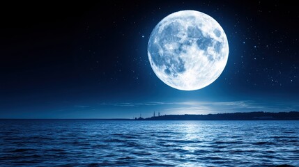 Full moon over calm ocean at night, city skyline.  Use Background, wallpaper
