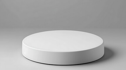 White round pedestal on gray background.