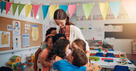 Happy, care and children hugging teacher in classroom for bonding, learning and thank you. Love,...