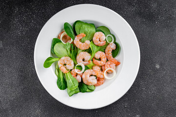 Shrimp salad seafood vegetables dish fresh delicious gourmet food background on table rustic food top view copy space keto and paleo diet vegetarian food pescetarian diet