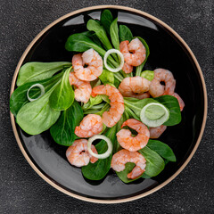 Shrimp salad seafood vegetables dish fresh delicious gourmet food background on table rustic food top view copy space keto and paleo diet vegetarian food pescetarian diet