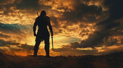 Heroic silhouette warrior with sword against dramatic sunset sky