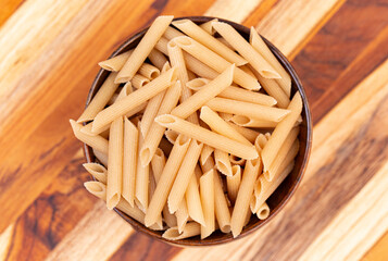 Gluten Free Penne Pasta in a Bowl on a Kitchen Counter