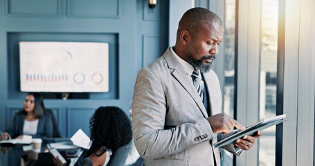 Business, reading and mature man with tablet, meeting and review of stock market on website and serious. Office, people and account manager with tech for industry trends, online and stats of company