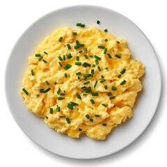 Scrambled eggs with chives on a white plate