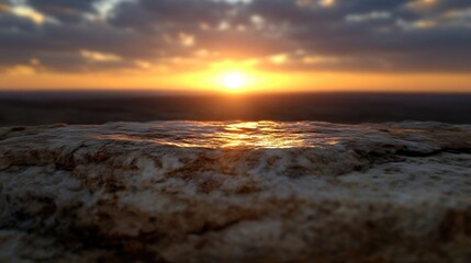 Obraz premium Sunset reflecting on rock outcrop