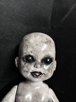 Scary horror vintage doll Creepy doll Halloween concept, Close up of Ghost doll mystic in abandoned places background