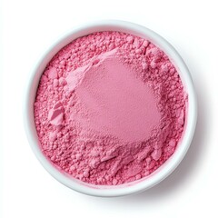 A vibrant closeup of pink powder rests elegantly in a clean white bowl against a striking white backdrop.