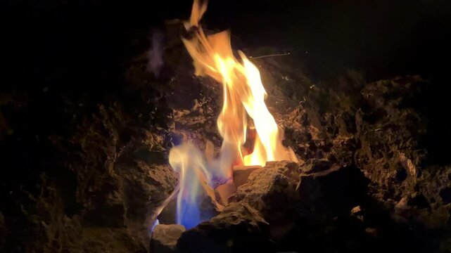 A fire on the slopes of Mount Chimera due to the accumulation of natural gas in the rocks in Cirali, Turkey. Flames on Mount Chimera rise from the ground. Eternal flame in Ancient Lycia. 4K