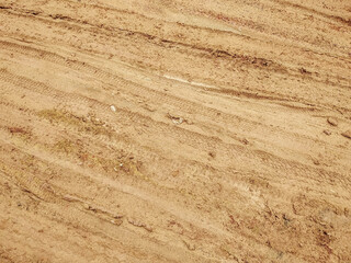 tire tracks on the dirt road