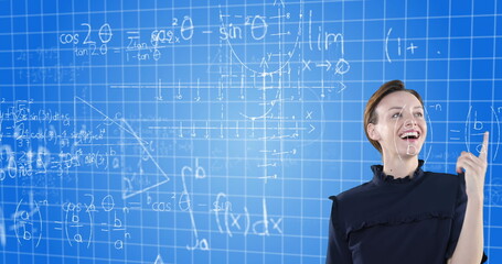 Explaining complex mathematical equations, woman using virtual board in school setting